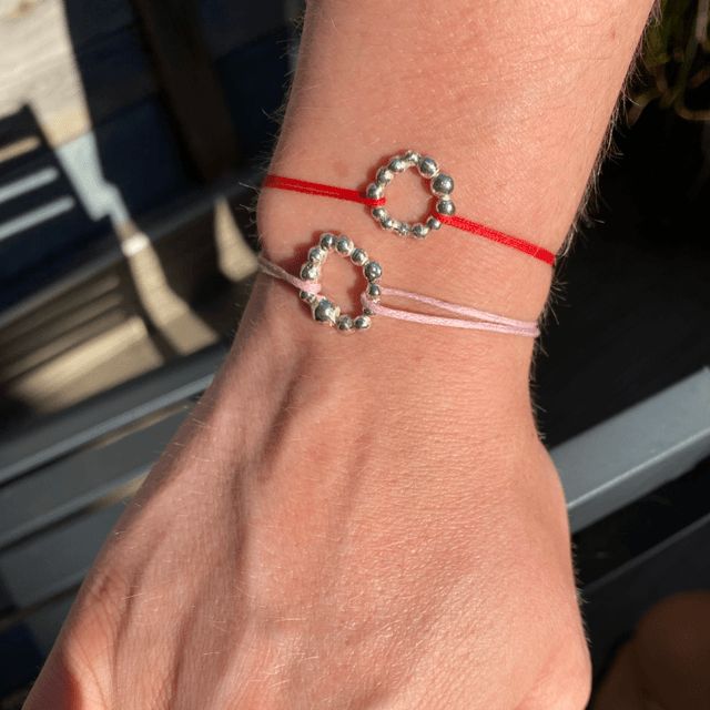 Bracelet cordon rose cercle gouttes 