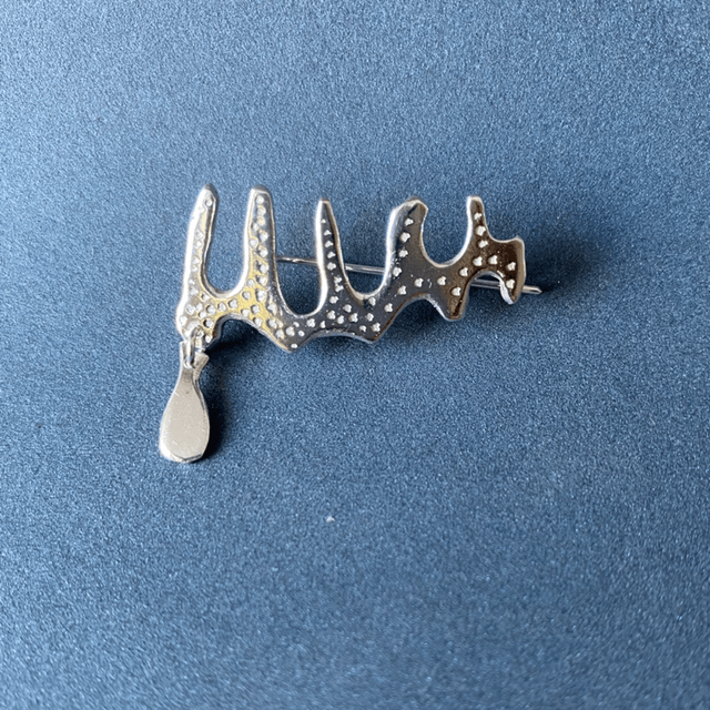 Bijou d’oreille branche de corail et goutte